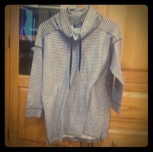 White and navy blue striped sweater.